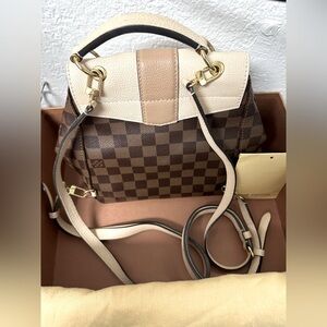 LV purse/backpack